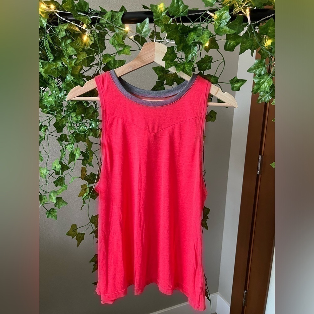 Pink muscle tee top with slit in the back size medium